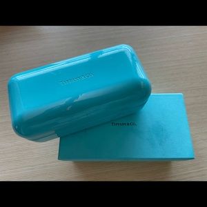 Tiffany and Co. brand cateye sunglasses.